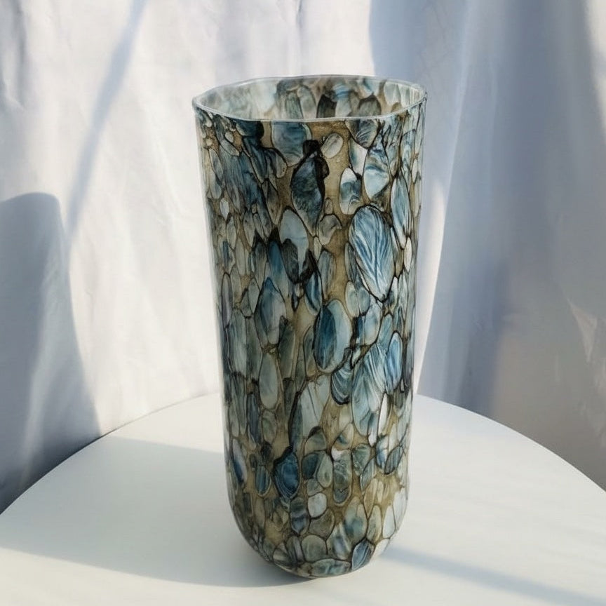 Angled perspective of patterned glass vase