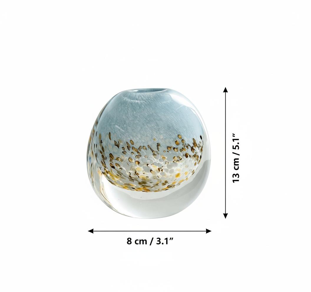 Large blue glass vase with purple flowers