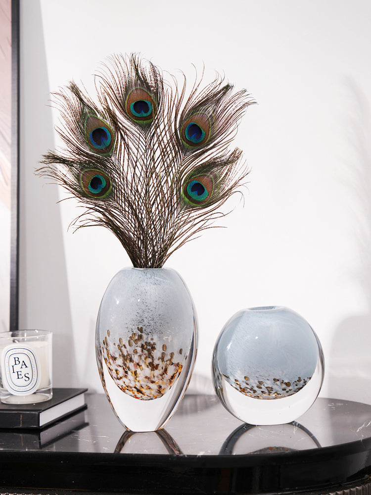 Lifestyle detail shot of blue glass vases