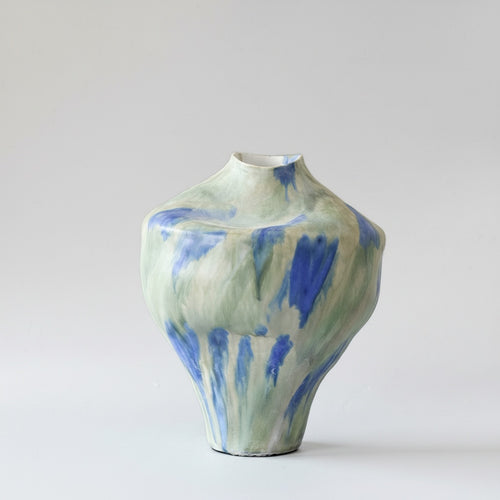 Large organic shaped ceramic vase with blue and green drip glaze