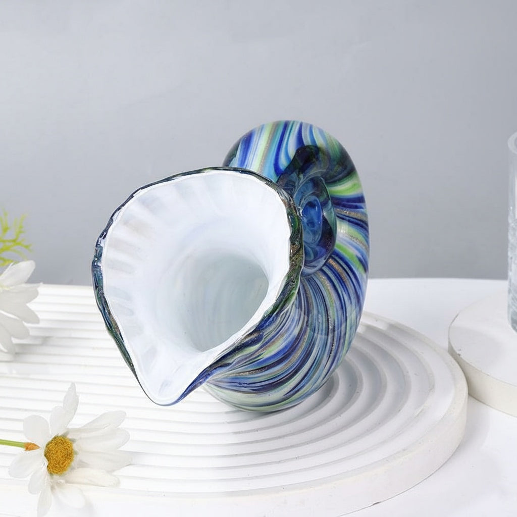 Front view showing white interior of glass shell sculpture