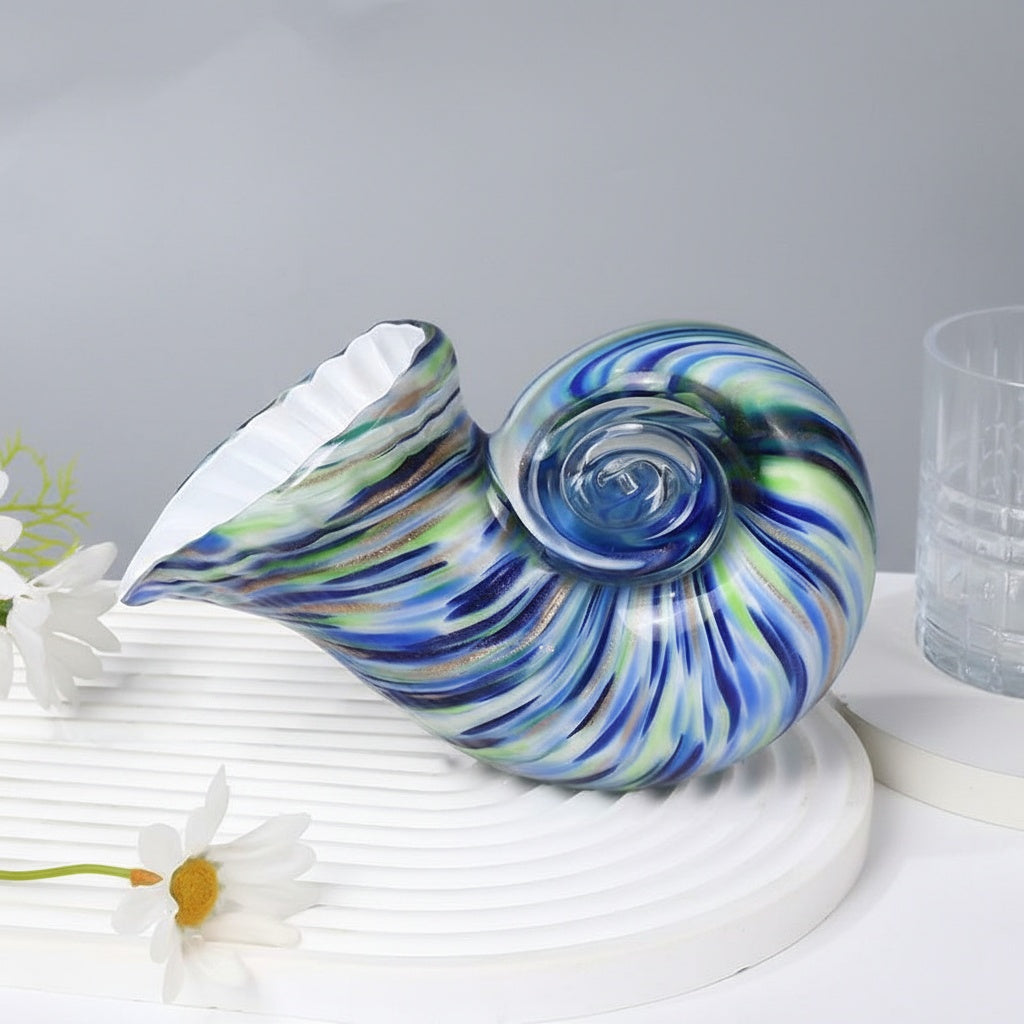 Angled view of artistic glass conch shell decor