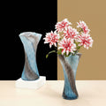 Two blue and grey textured glass vases styled with and without flowers