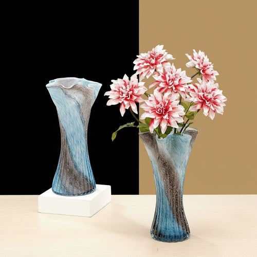 Two blue and grey textured glass vases styled with and without flowers