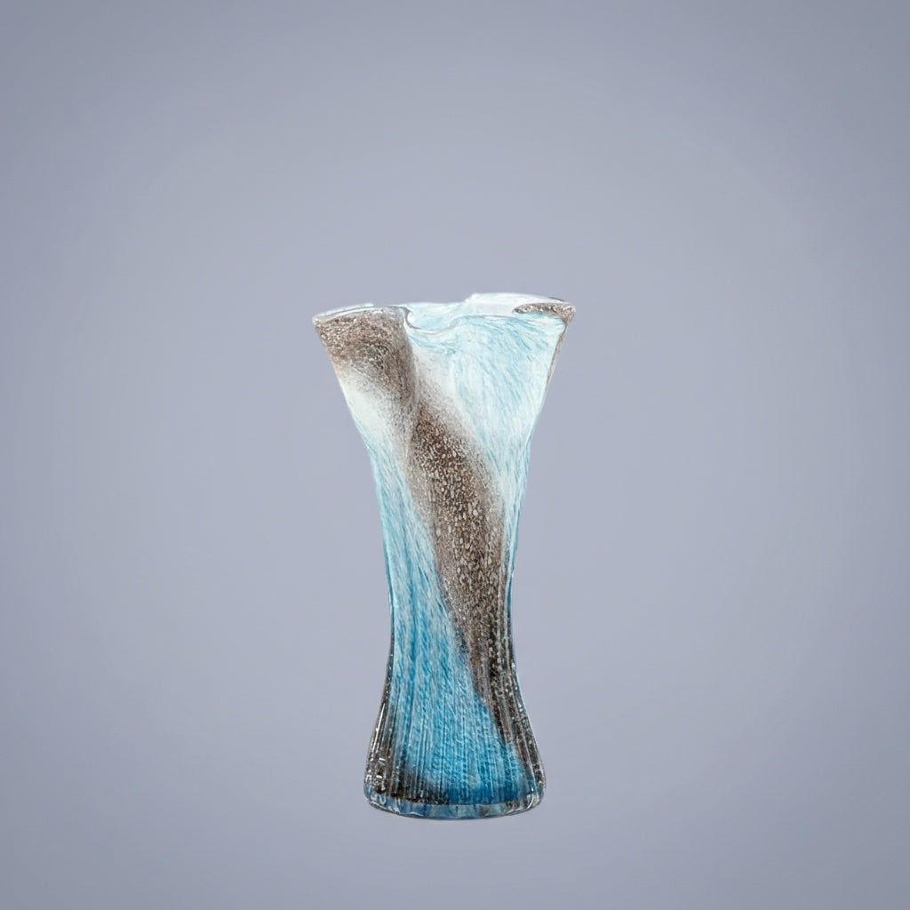 Front view of blue and grey textured glass waisted vase on grey background