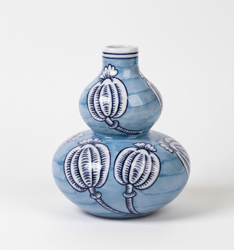 Front view of empty blue patterned ceramic double gourd vase