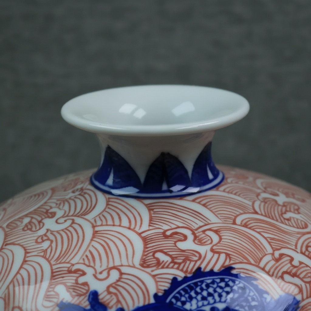 Blue and red dragon motif porcelain vase