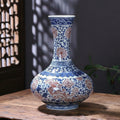 Blue and red floral porcelain vase with dragon motif
