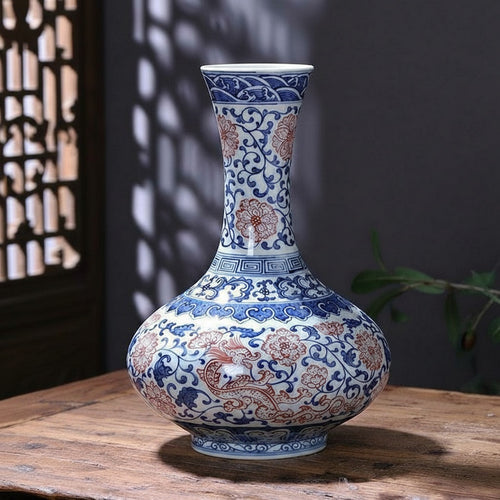 Blue and red floral porcelain vase with dragon motif