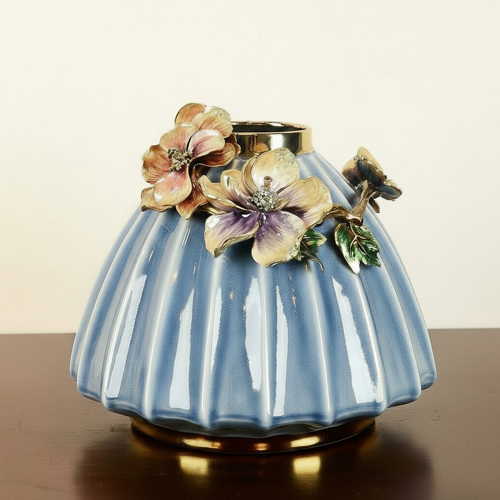 Medium blue ceramic vase with pink enamel flower and gold rim