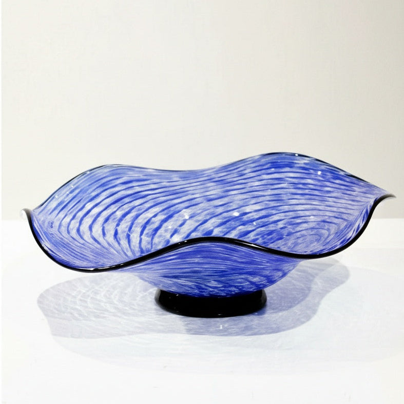 High angle view of blue swirl pattern inside glass bowl