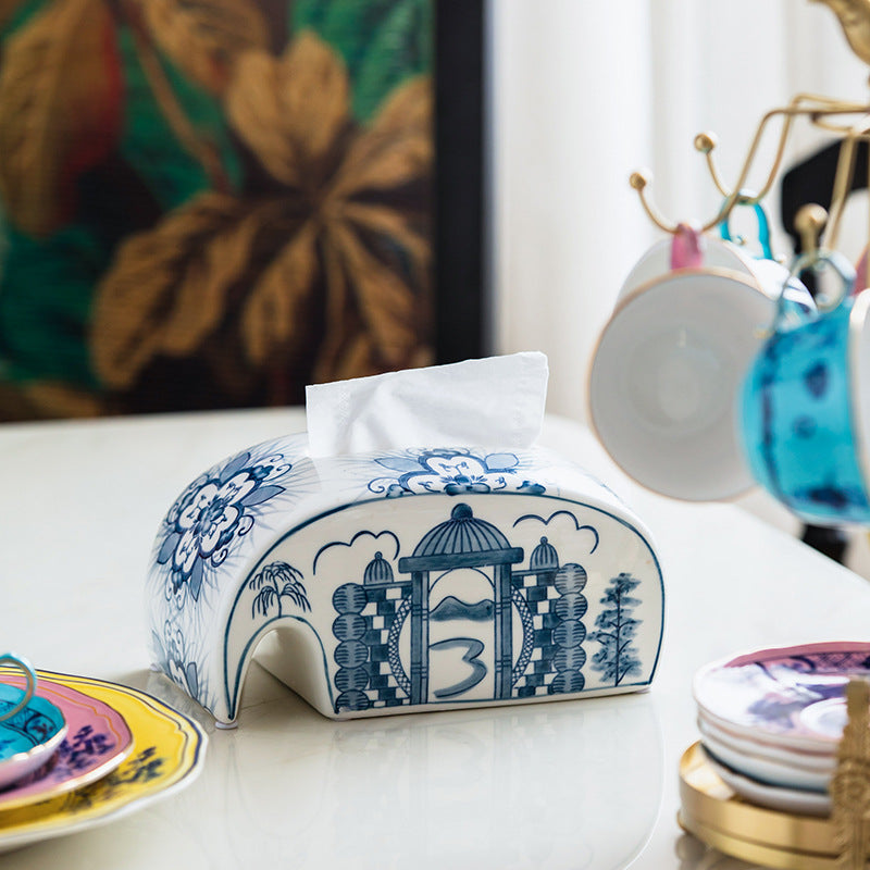 Ceramic tissue holder with blue floral patterns in luxury setting
