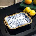Lifestyle view of ceramic and copper tray on table with decor