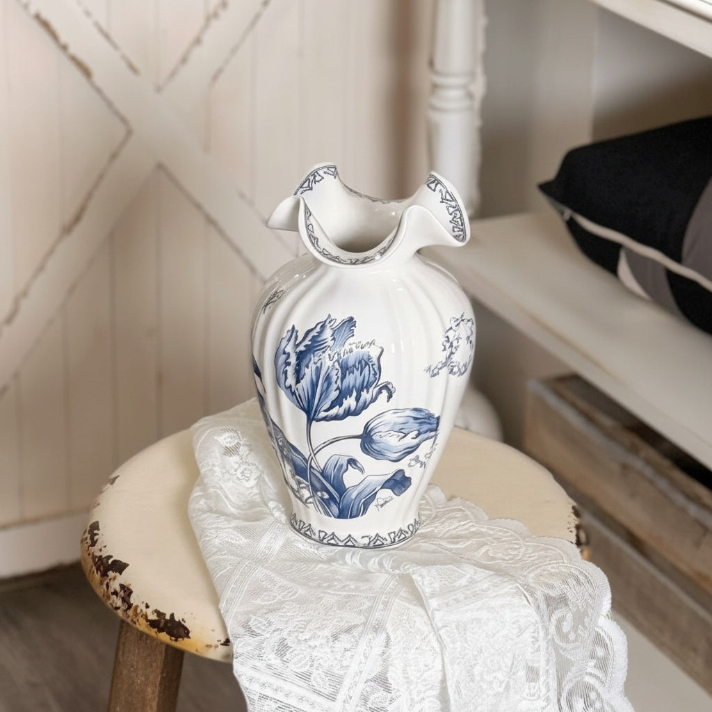 Close up of blue and white ceramic fluted vase