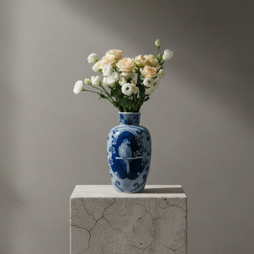 Lifestyle shot of ceramic vase with fresh flowers in living room