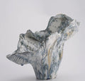 Front view of abstract blue and white glazed ceramic sculptural vase
