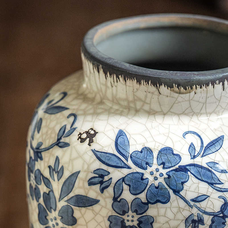 Close up detail of crackle glaze finish and blue floral pattern