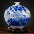 Blue and white porcelain spherical vase with landscape design