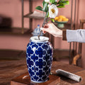 Blue & White Patterned Ceramic Vase with Flowers