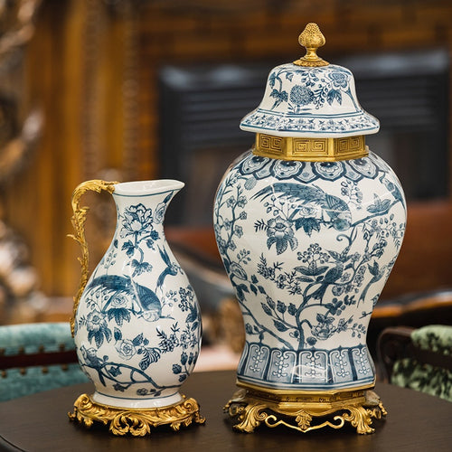 Blue and white porcelain ginger jar and pitcher set with ornate brass bases