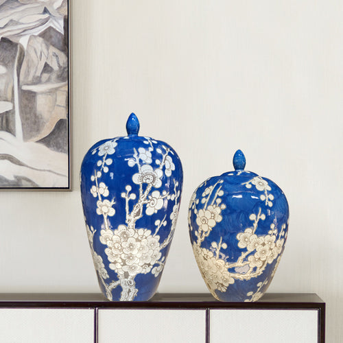 Set of two blue porcelain temple jars on a sideboard
