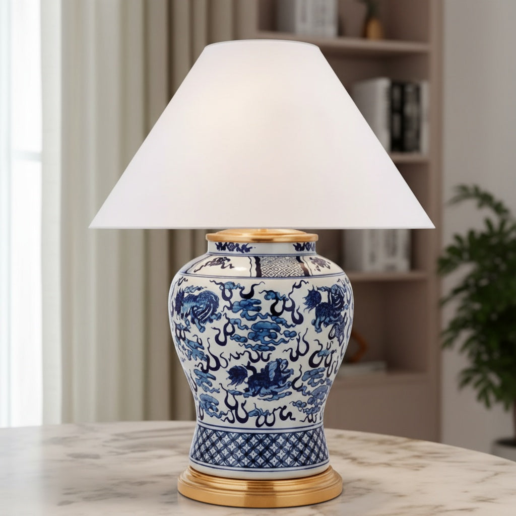 Front view of blue and white ceramic lamp with brass base