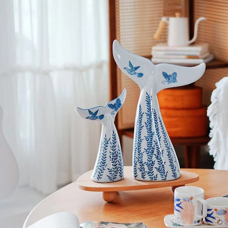 Detail of blue and white ceramic pattern on whale tails
