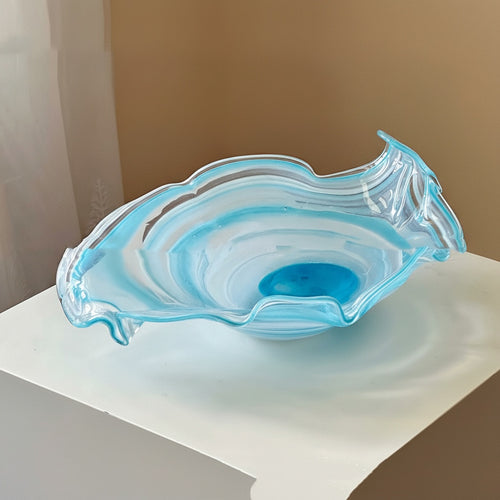 Blue and white swirl art glass bowl side view