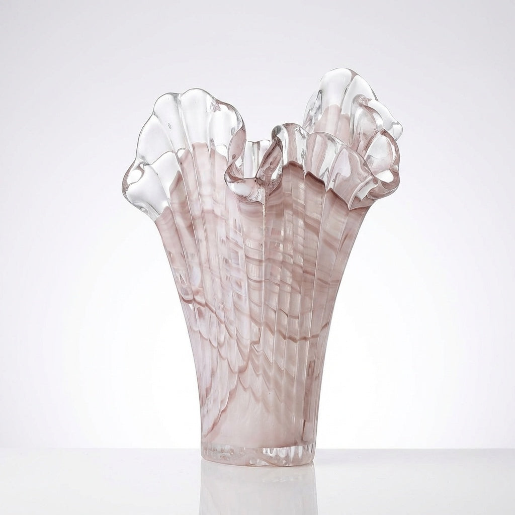 Side view of pink art glass vase showing ribbed texture