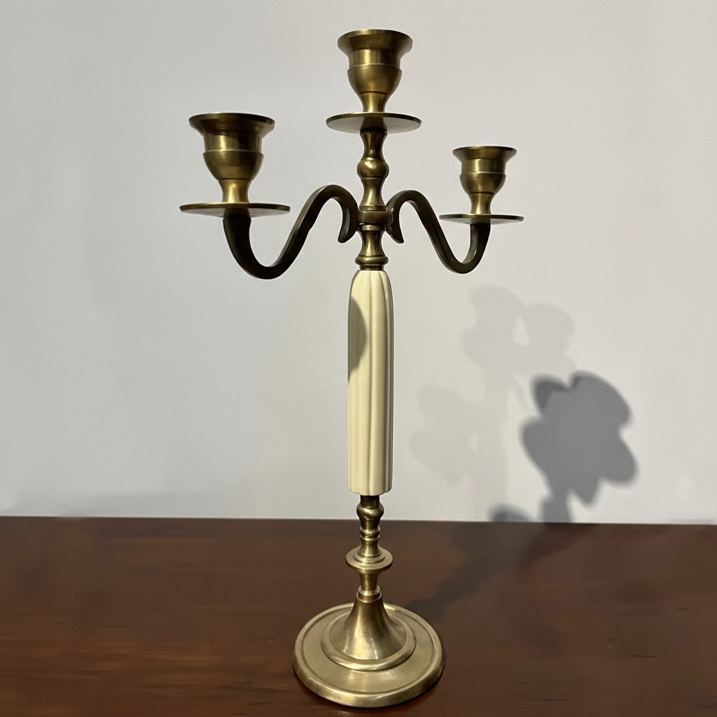 Full view of 3-arm brass candelabra with cream column