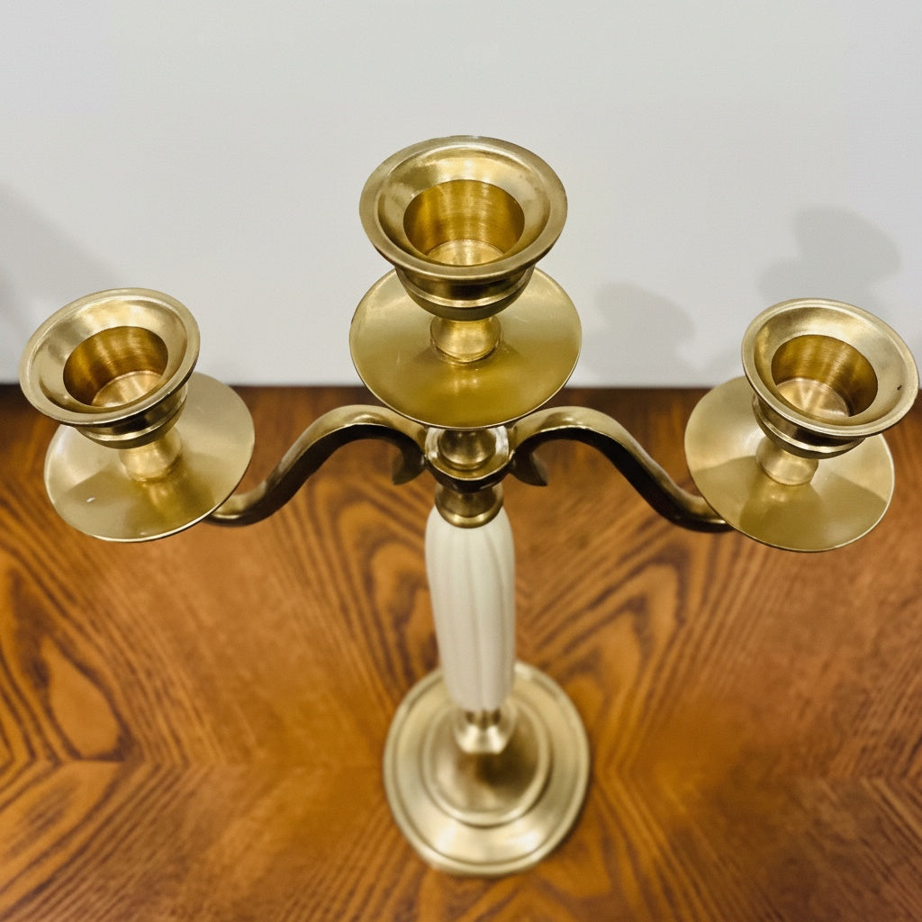 Top down view of brass candle holder cups