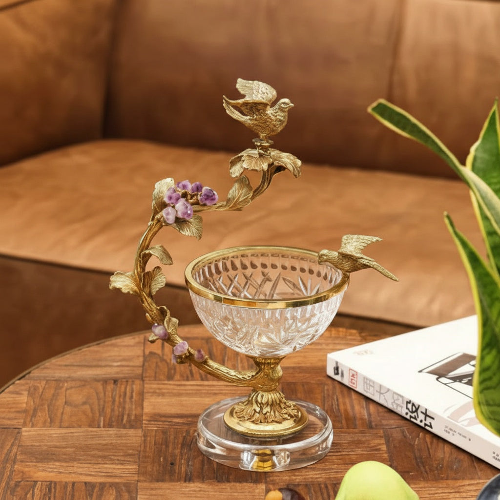 Front view of brass bird centerpiece with crystal bowl