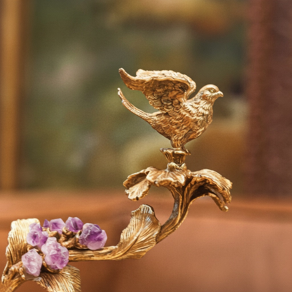 Detail of brass bird and purple stone accents