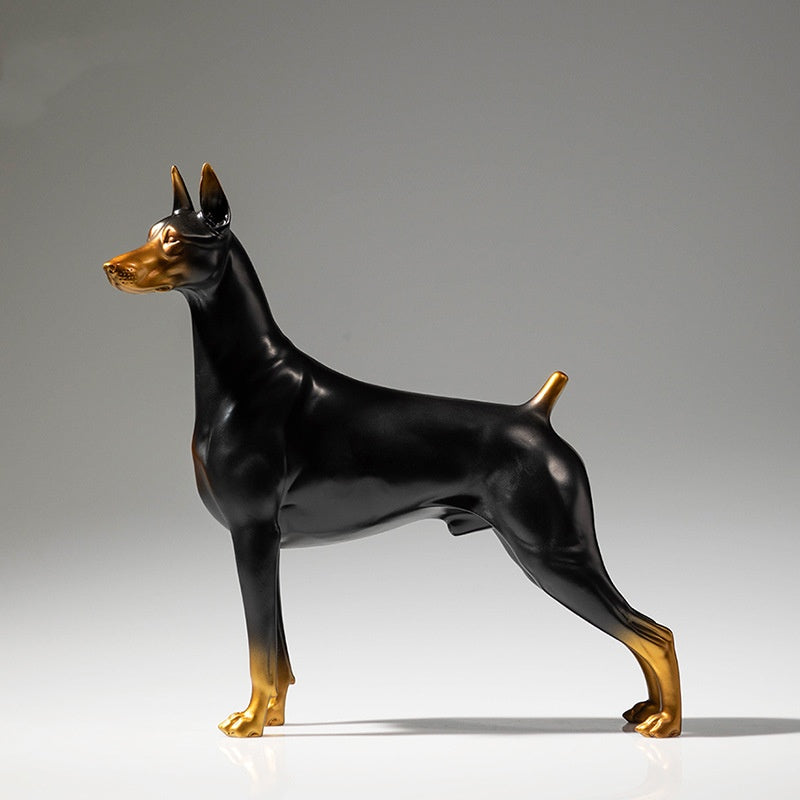 Side profile view of standing Doberman sculpture
