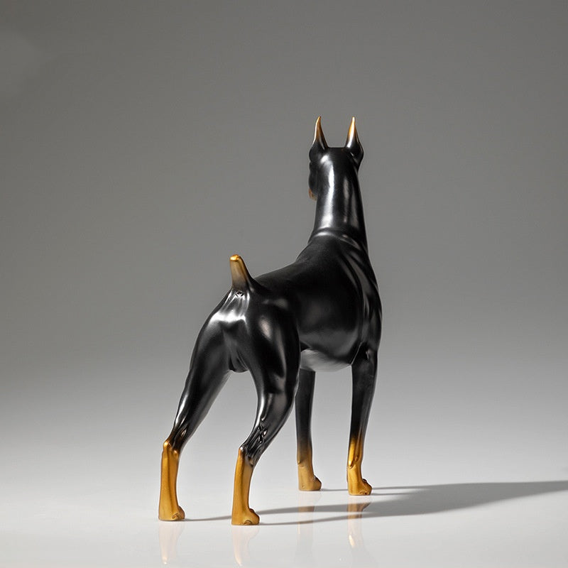 Rear view showing brass detailing on Doberman figurine