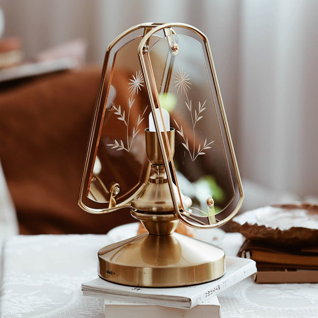 Front view of brass finish lamp with etched acrylic panels