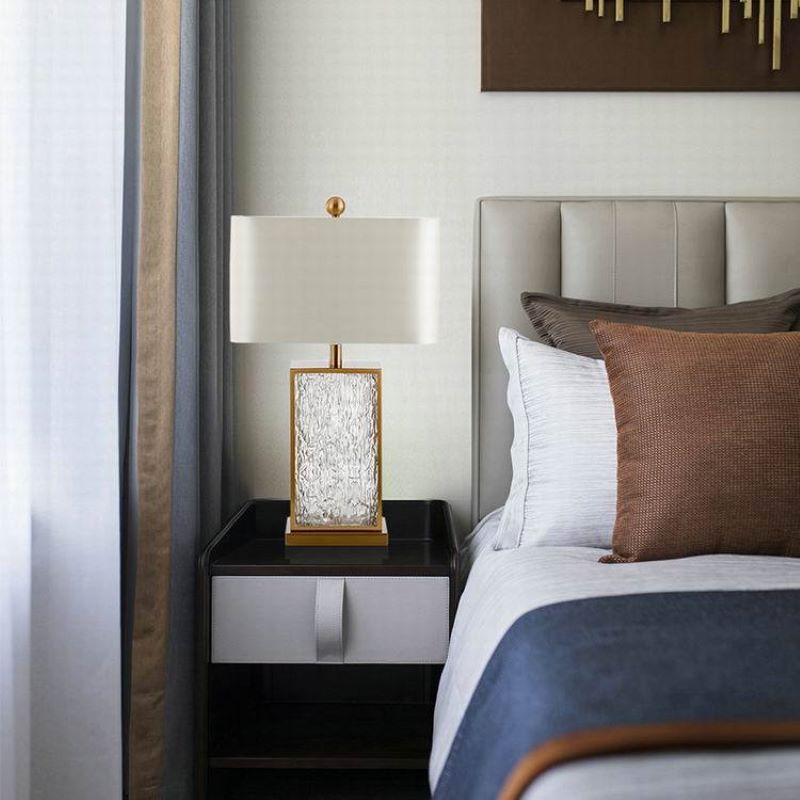 Luxury table lamp on nightstand in bedroom context