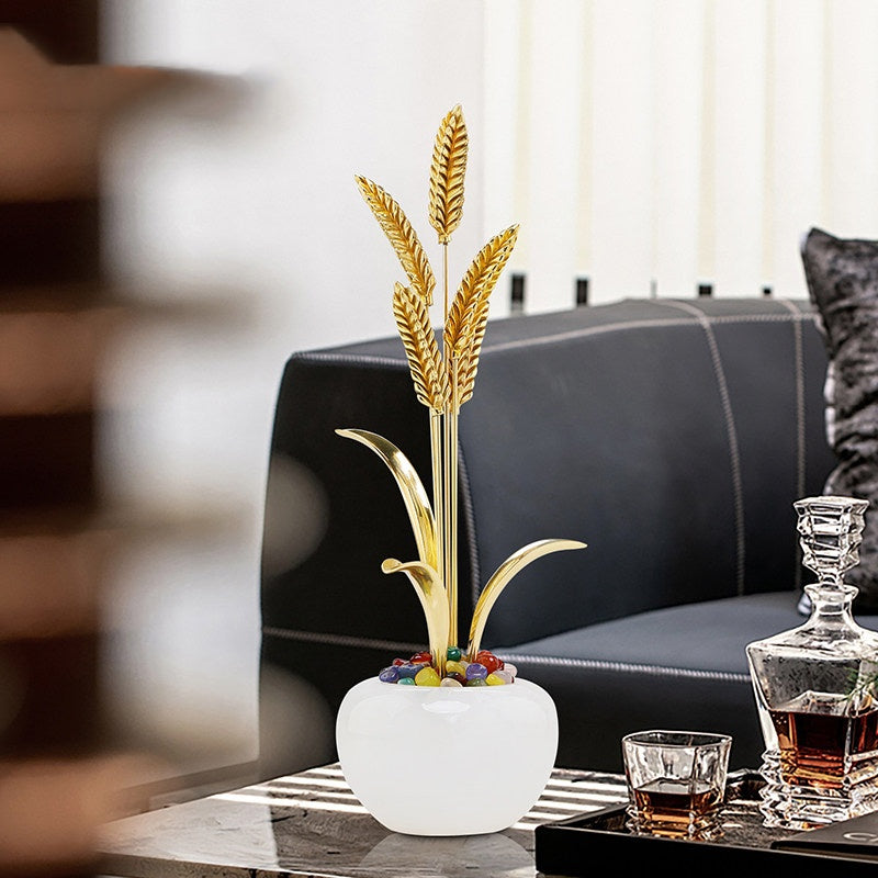 Luxury brass wheat sculpture styled in living room