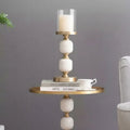 Brass And White Marble Stacked Sphere Candle Holder Lifestyle View