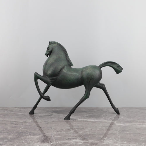 Side profile view of antique bronze finish prancing horse sculpture