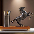 Bronze finish rearing horse sculpture with pen holder on wooden base