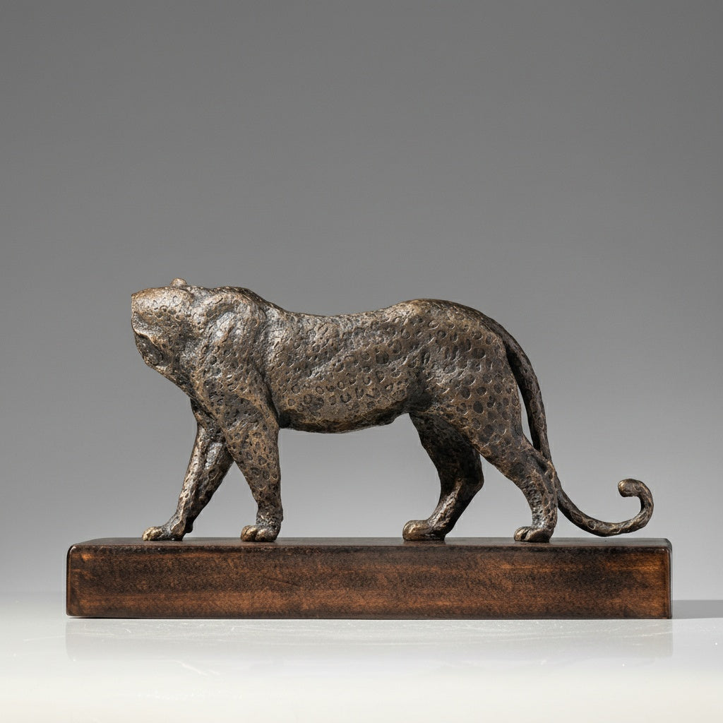 Rear angle view of textured bronze leopard statue