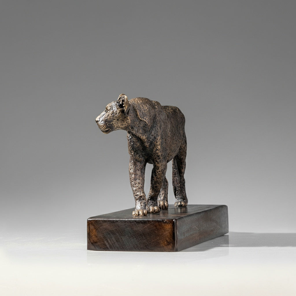 Front angle view of walking leopard figurine details