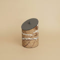 Brown marble angled canister with grey leather lid front view
