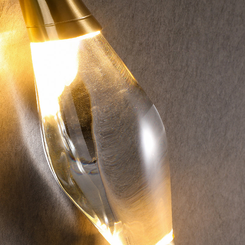 Close-up detail of the sculpted crystal and brushed metal finish