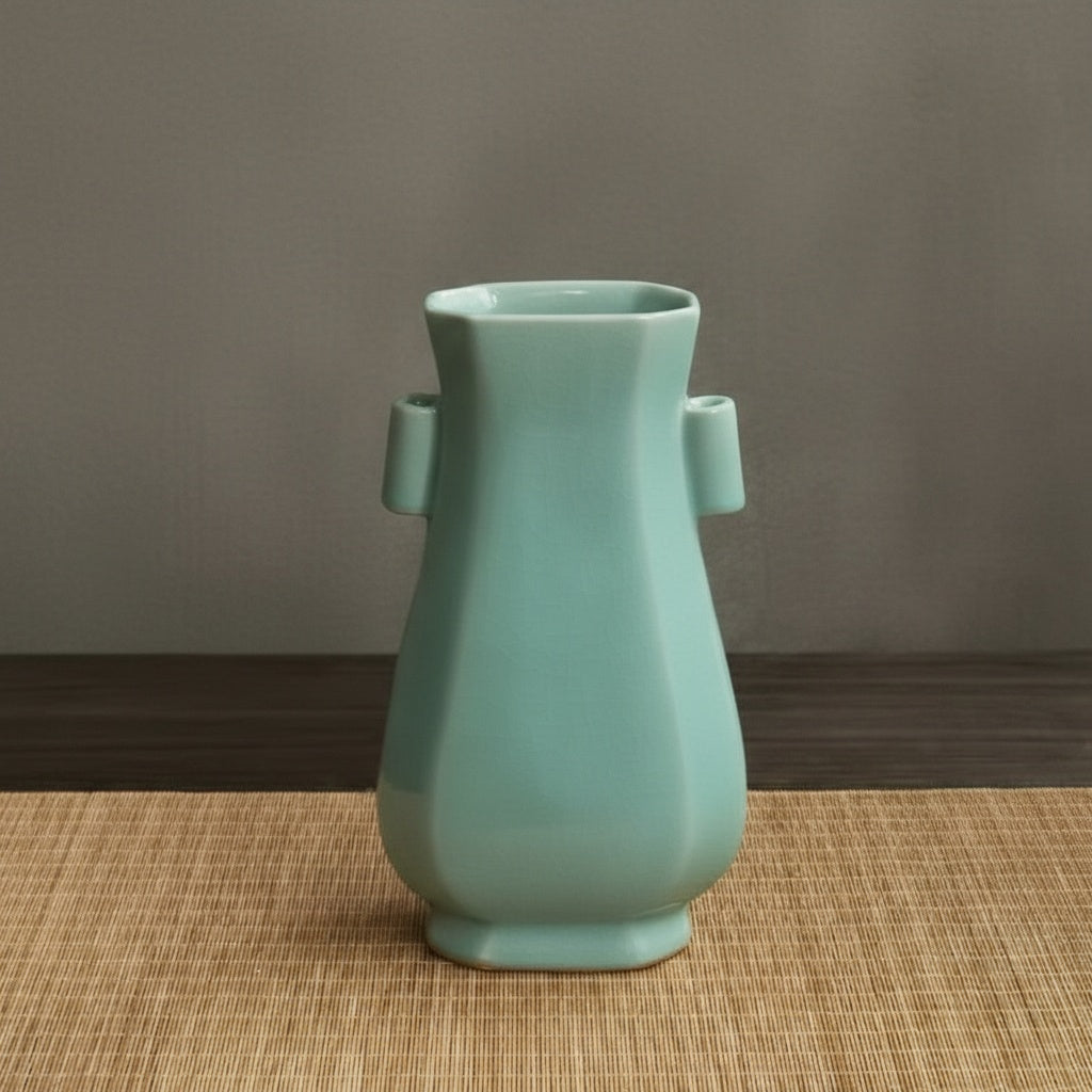 Celadon ceramic hexagonal vase with glazed finish front view