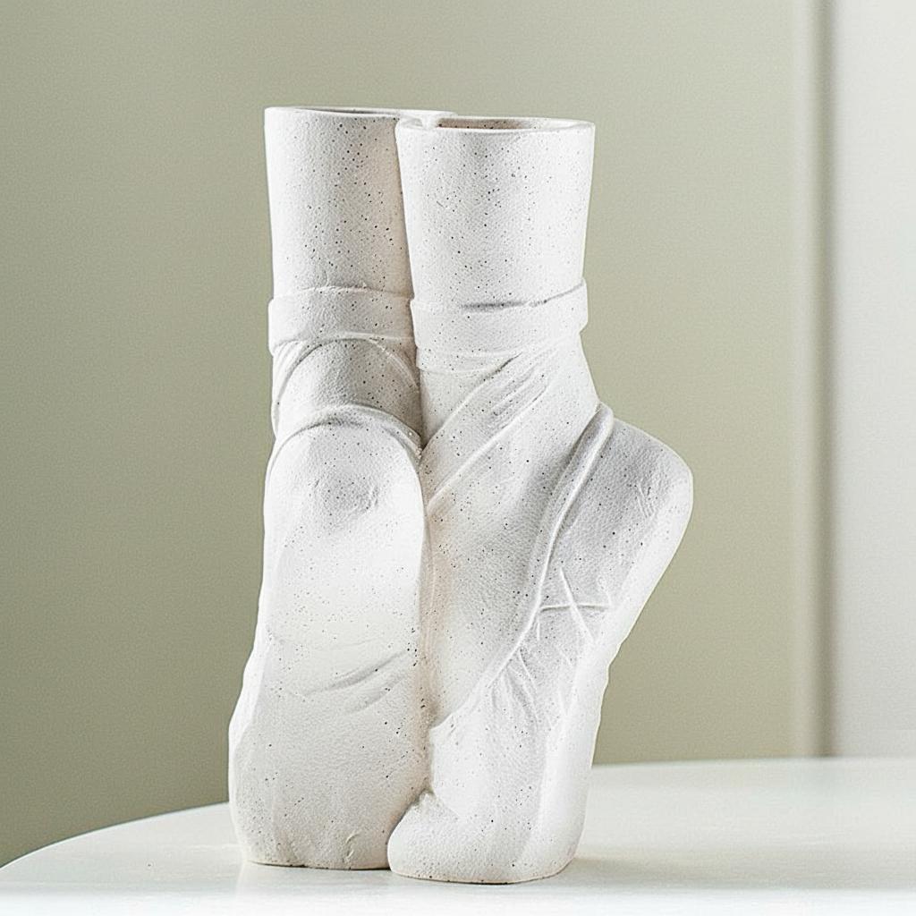 Back view of white speckled ceramic ballet vase