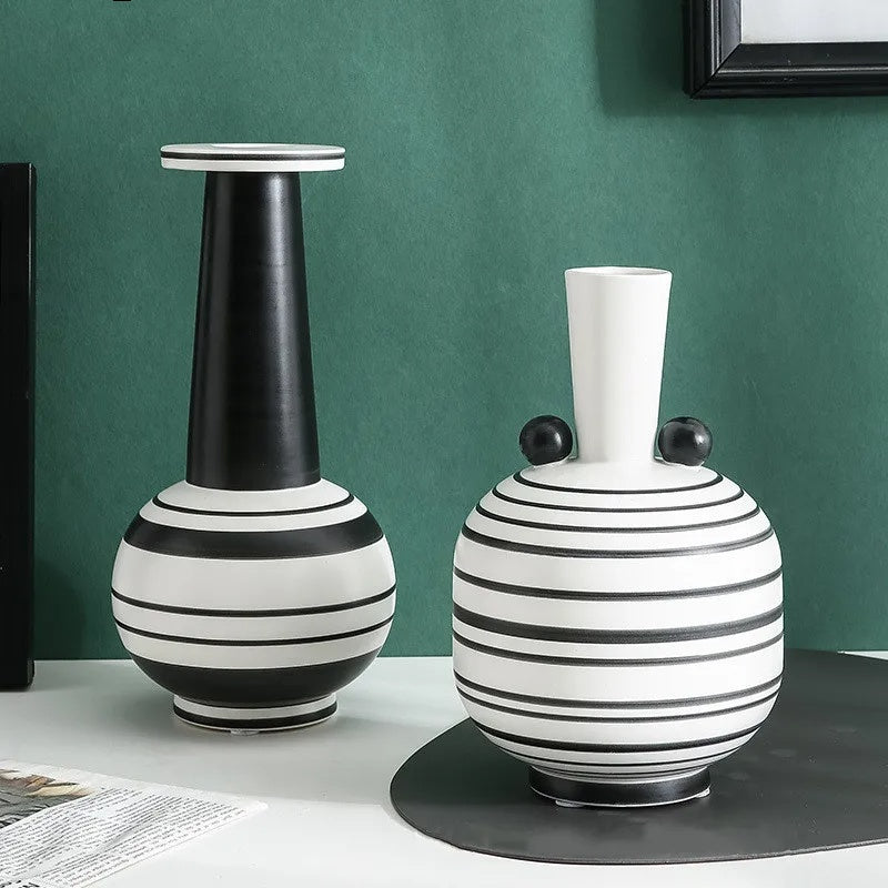 Ceramic black and white striped spherical vases group view