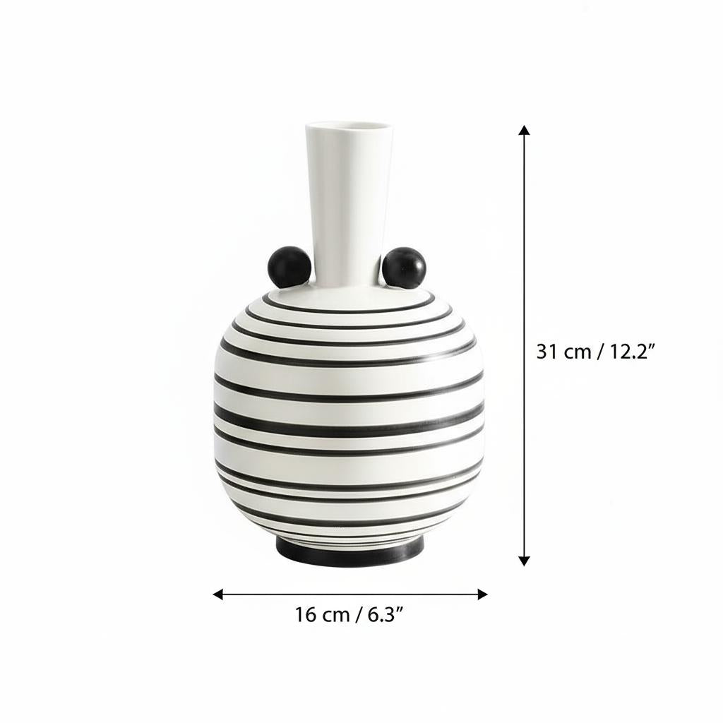 Front view of white striped ceramic vase with accents