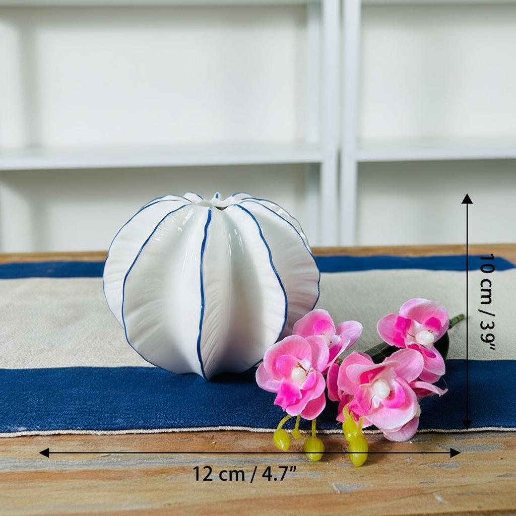 Side view of round white ceramic vase